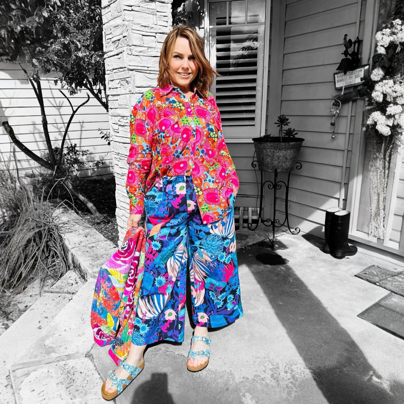 Denim wearable art pants featuring original artwork on sustainable fabric