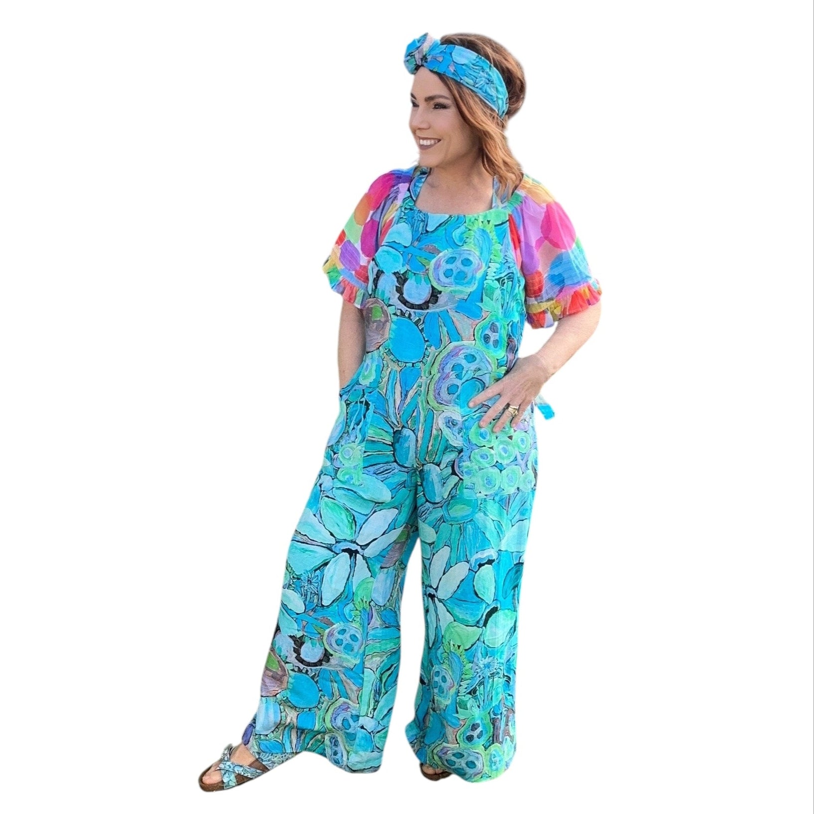 Turquoise jumpsuit in floral linen design