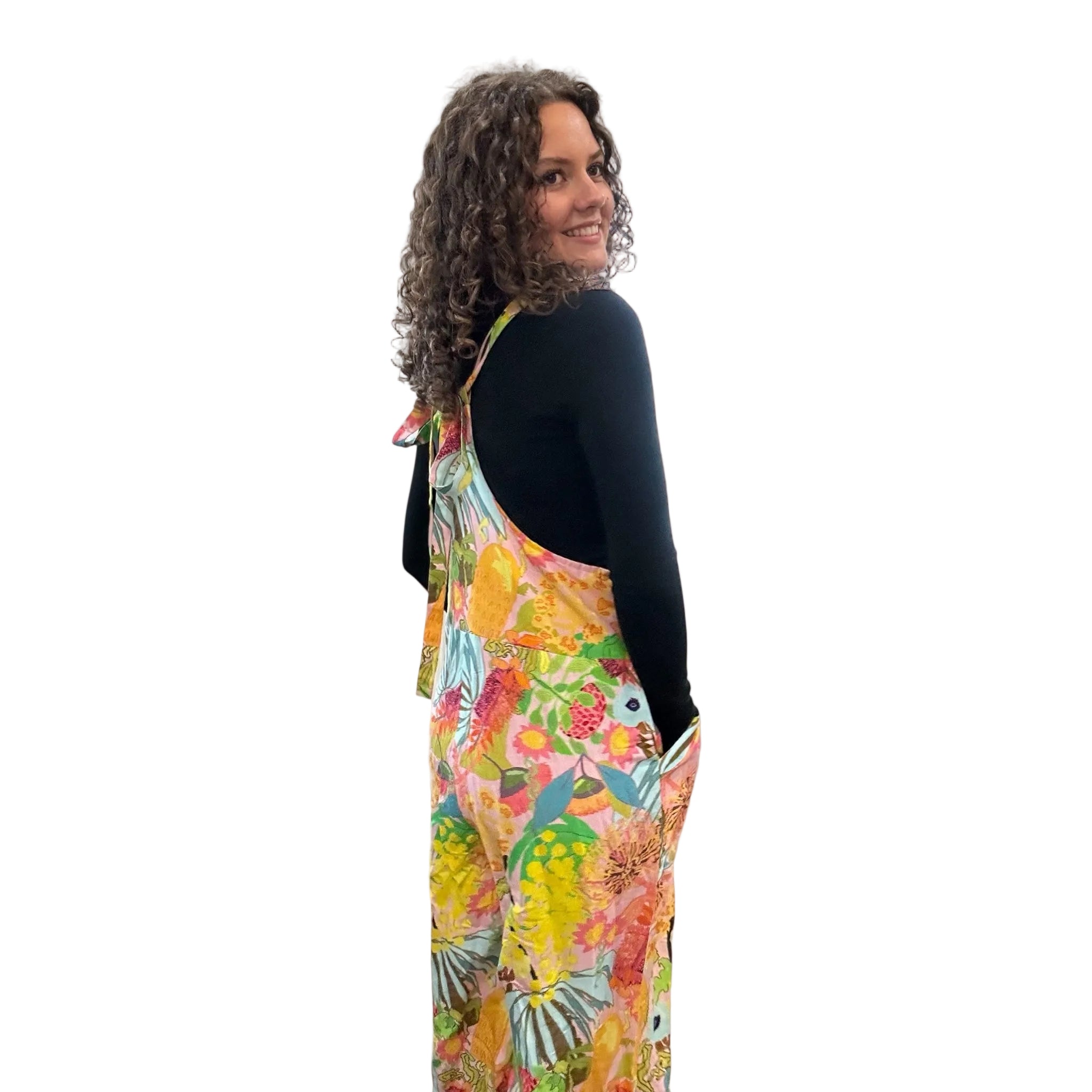 Wearable art jumpsuit in an intuitive expressionist style, designed for bold women's fashion back view.