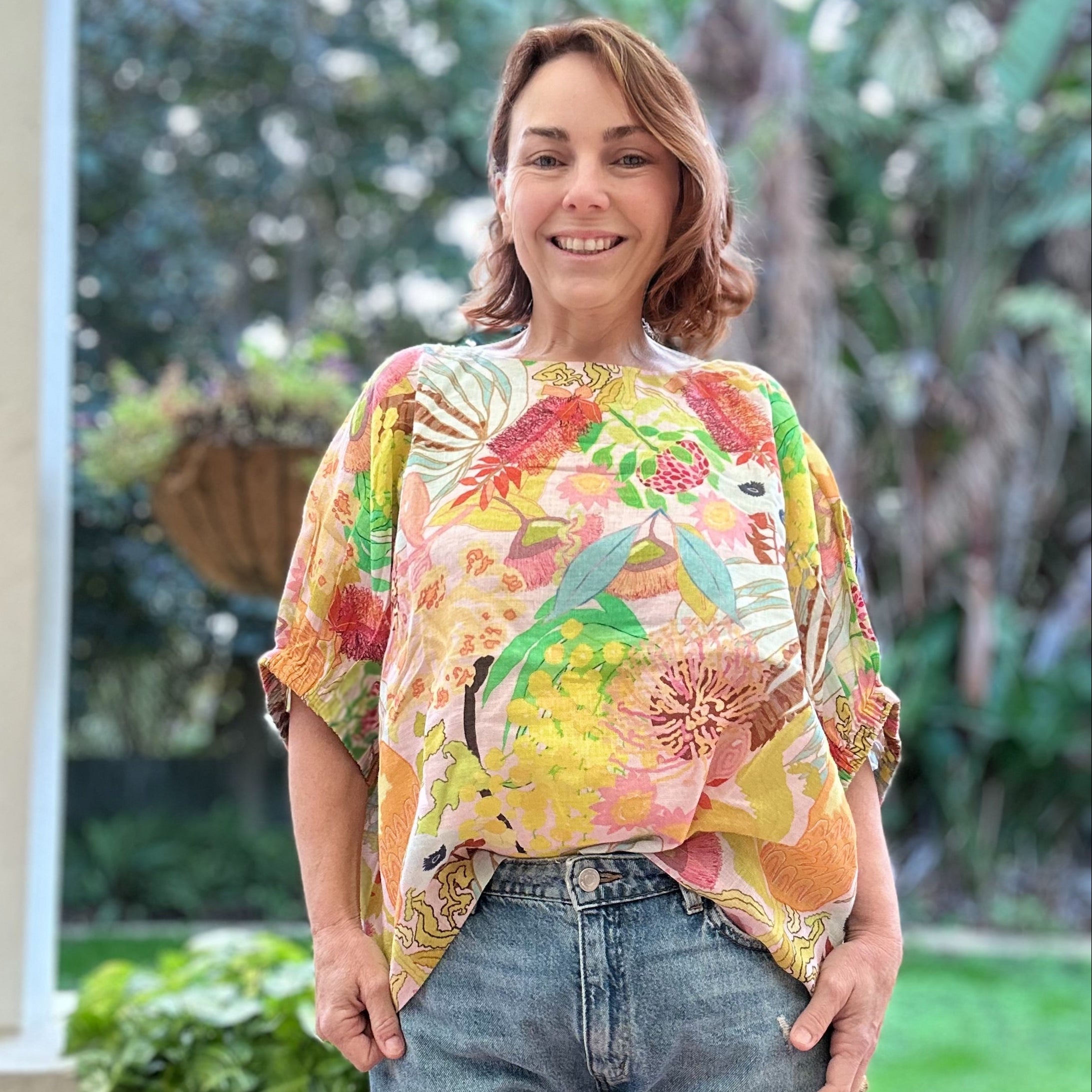 Jeunesse linen top featuring Australian native botanical artwork inn yellows printed on breathable linen