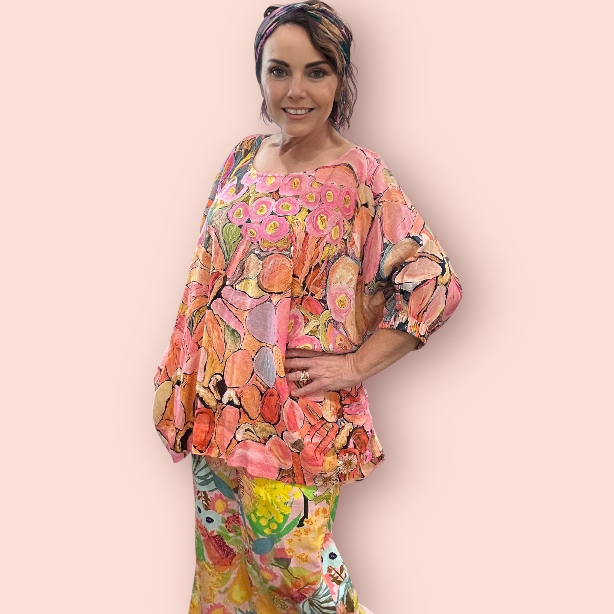 Lightweight linen shirt with vibrant wearable art print side front view