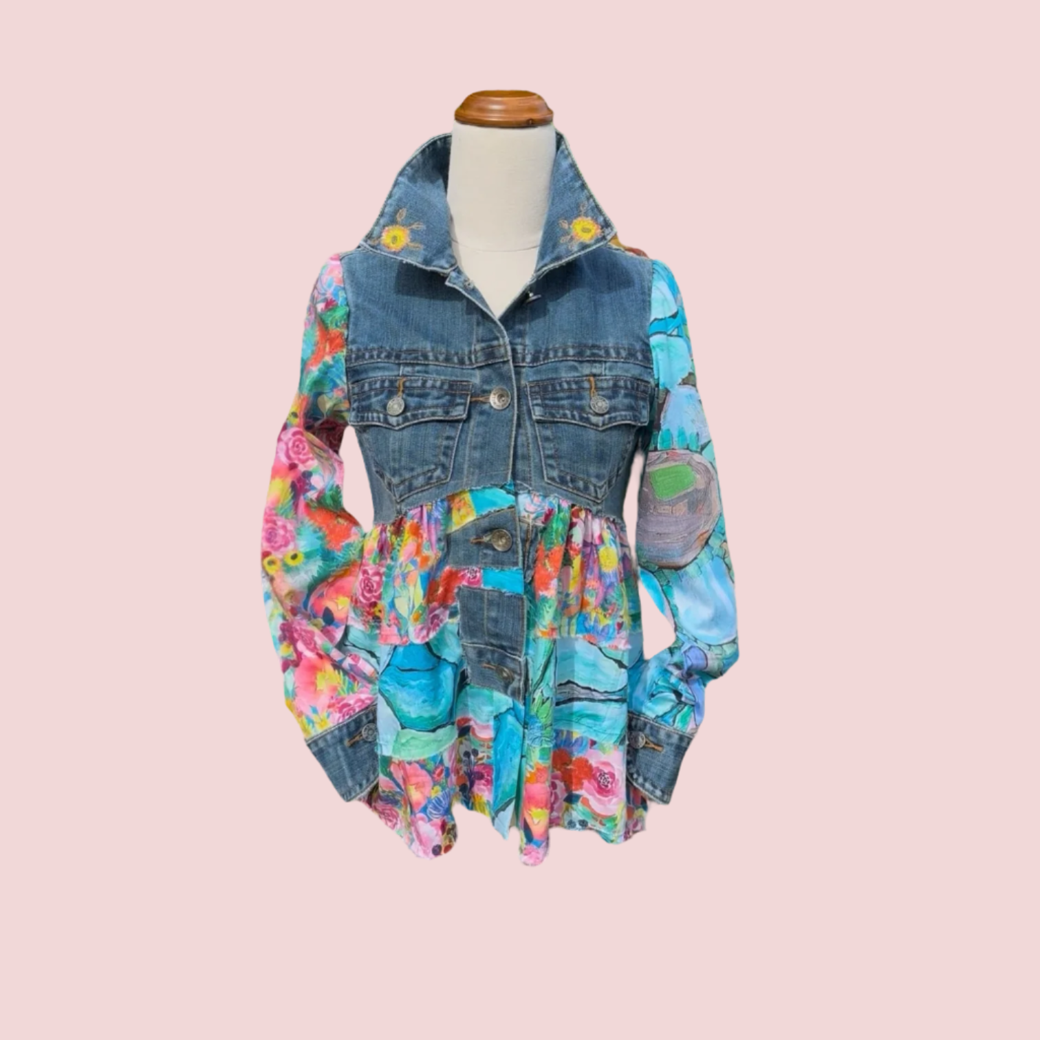 Bold recycled denim jacket transformed into vibrant wearable art, part of sustainable women's fashion 2