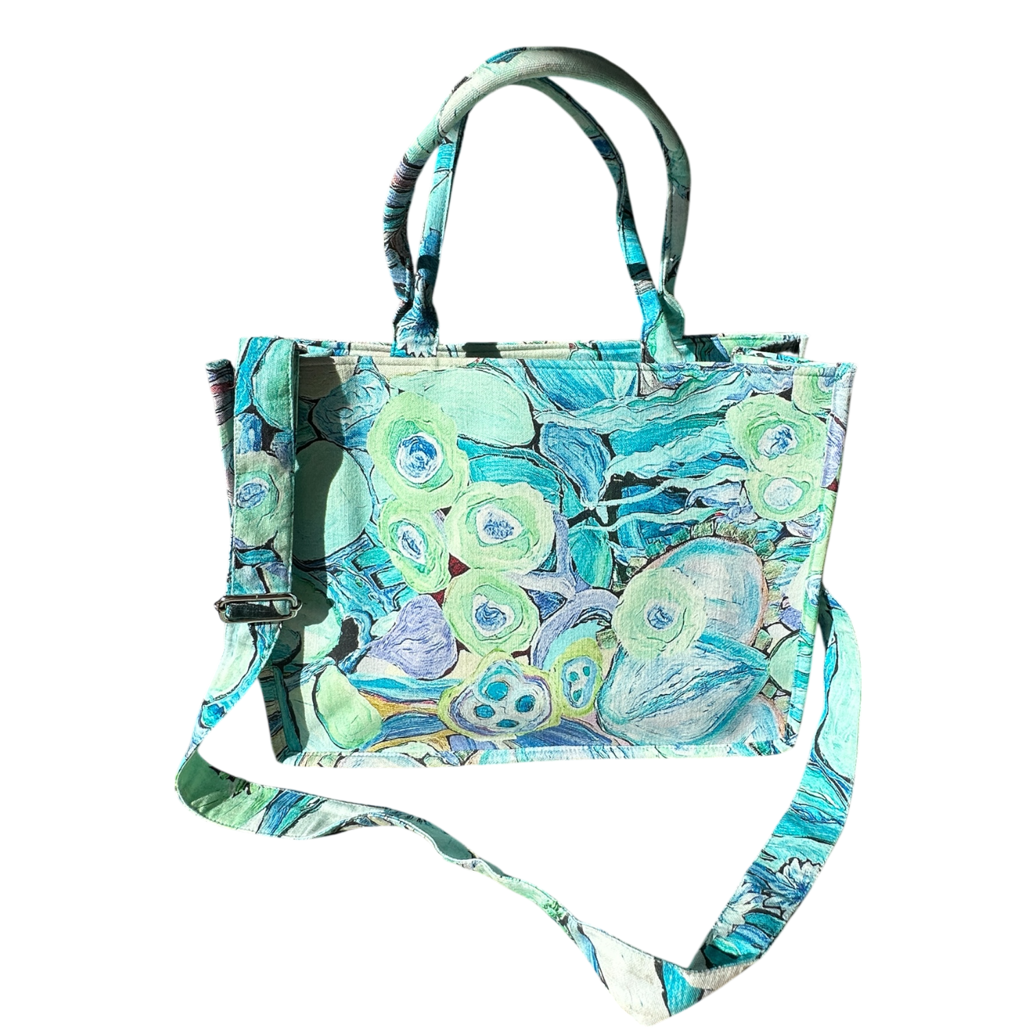 Australian artist designed blue floral tote handbag with adjustable strap and vibrant wearable art print
