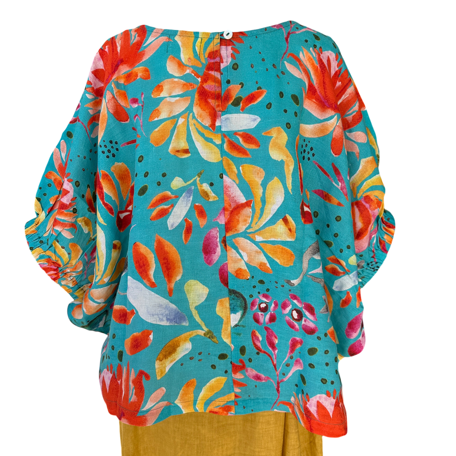 Back view relaxed fit turquoise linen top featuring bold colourful floral artwork