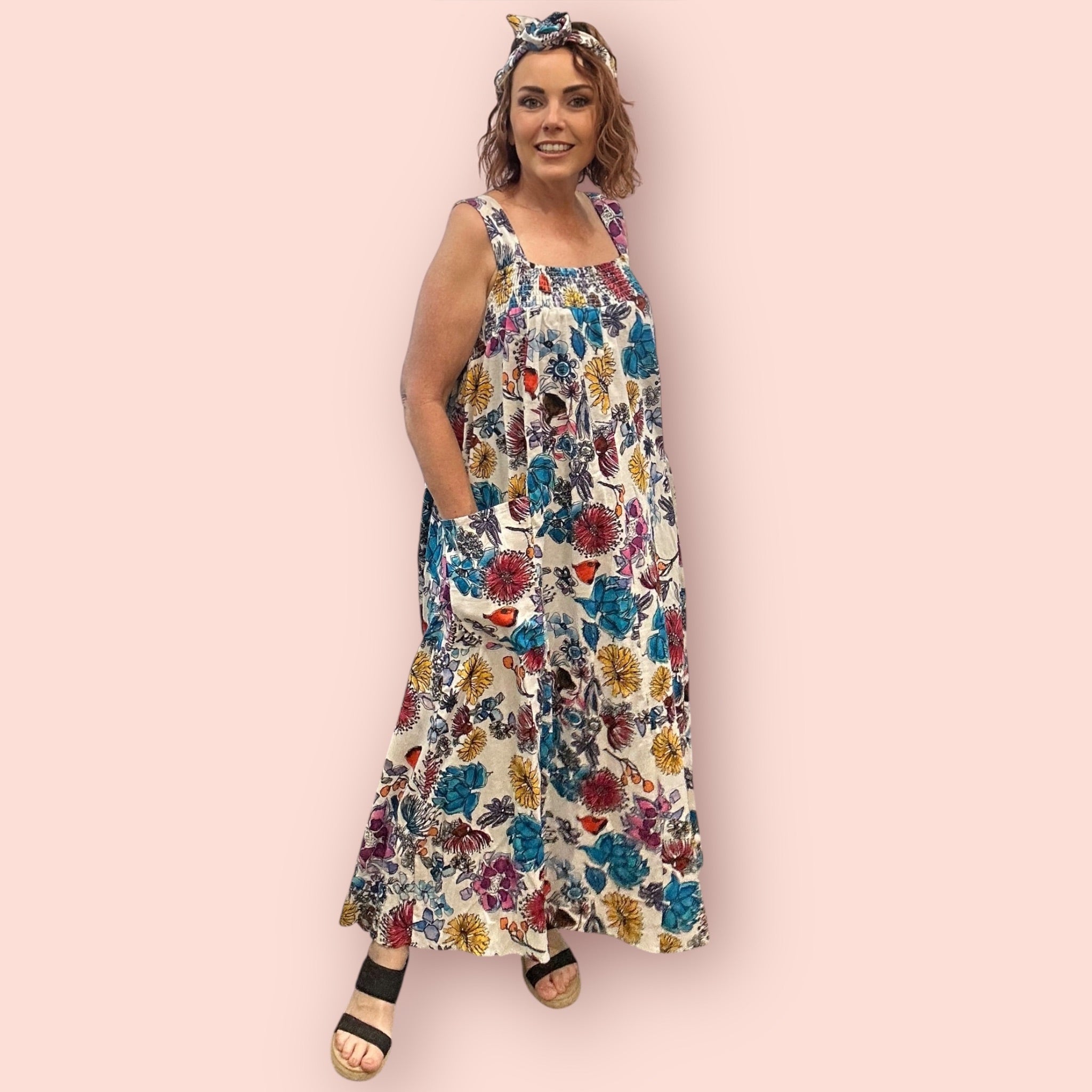 Floral linen dress designed for plus-size women, featuring expressive wearable art