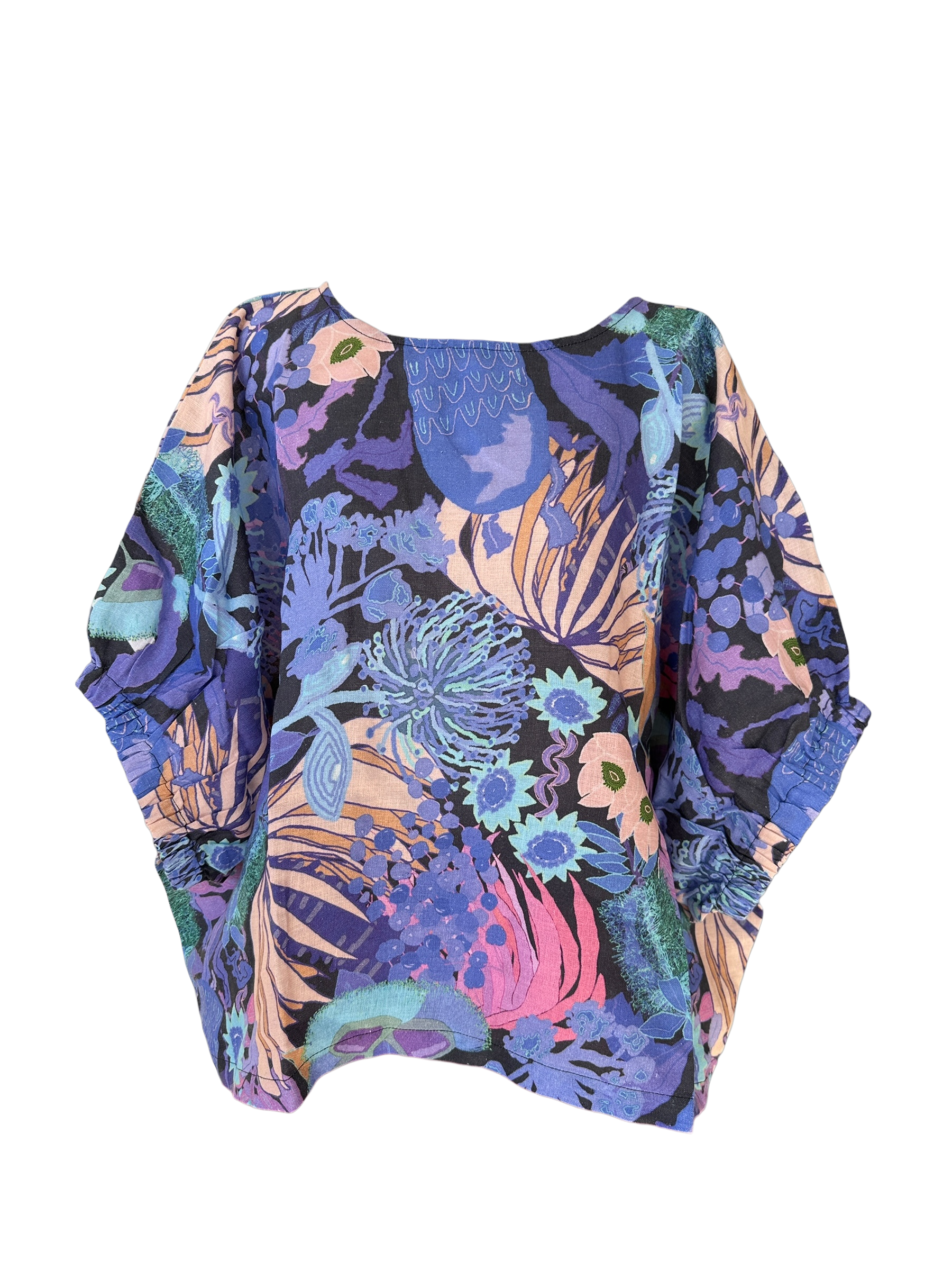 Relaxed fit indigo linen top featuring colourful botanical print design