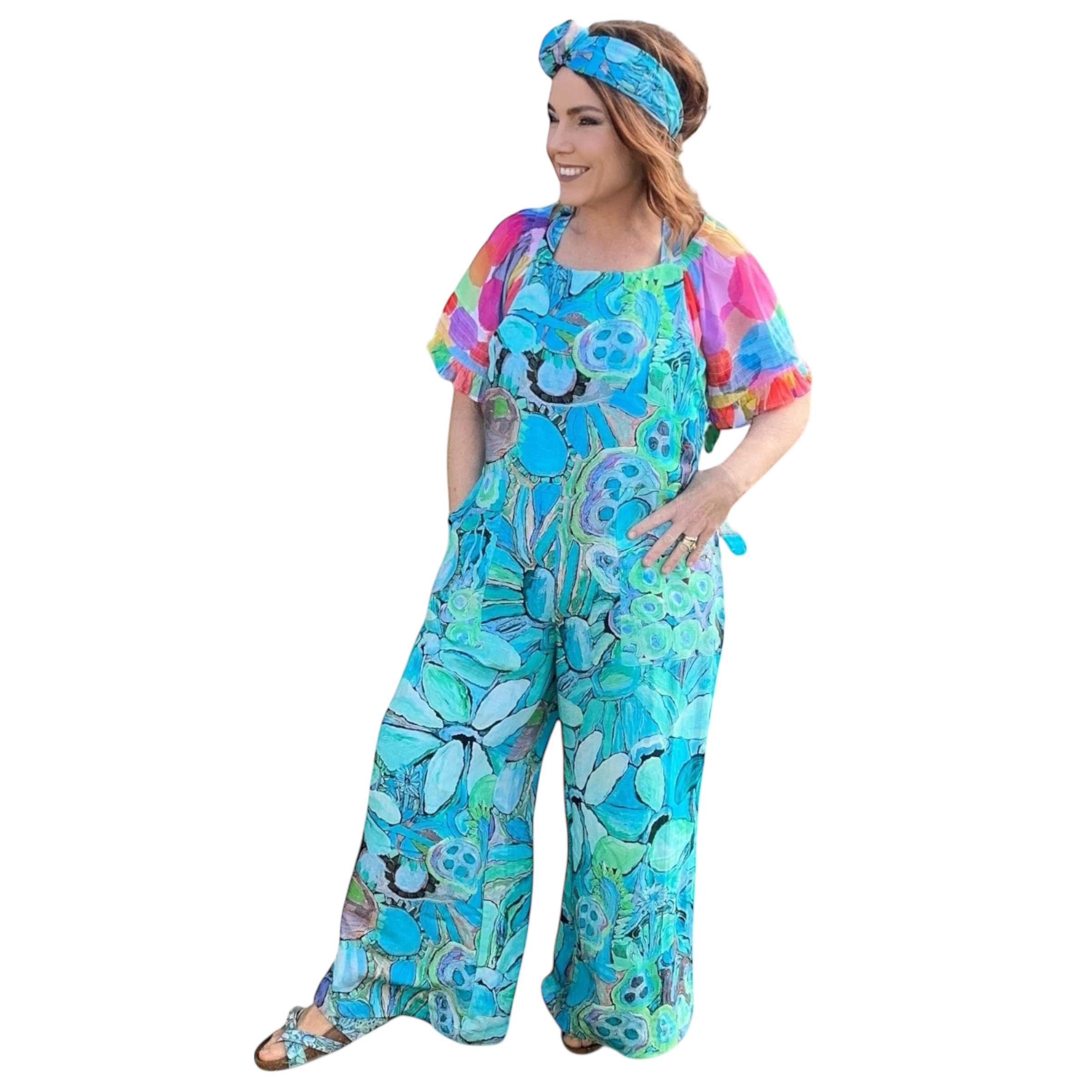 Turquoise jumpsuit in floral linen design