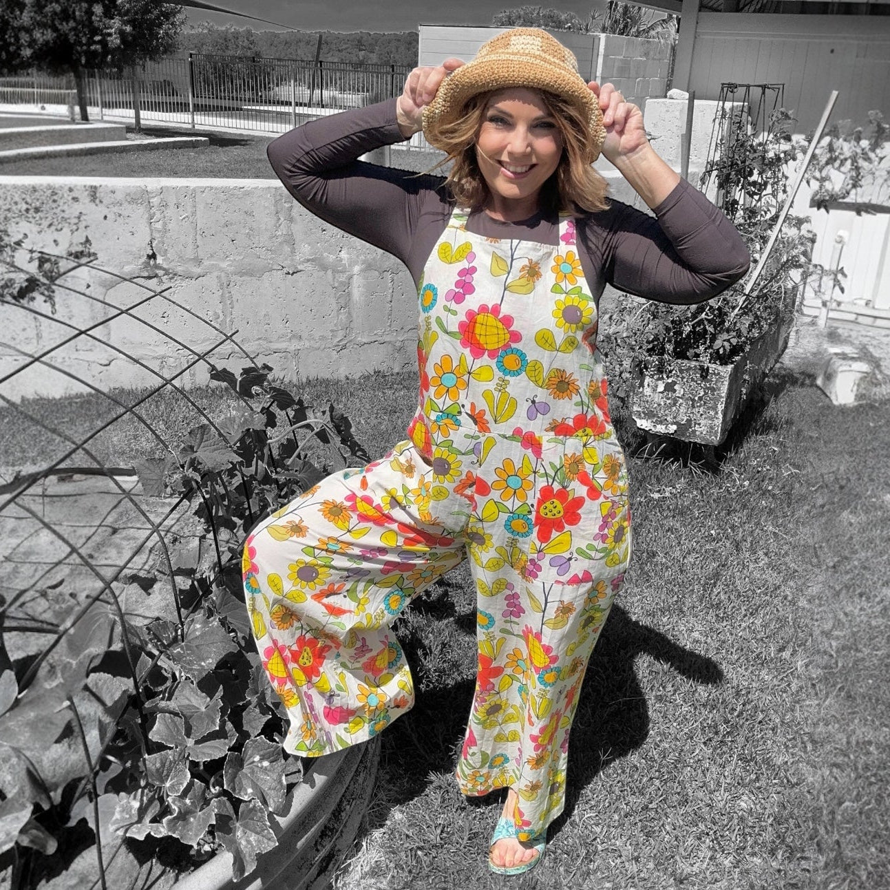 Zoe Playsuit in Tweedledee White by Kerry Munns Artlife made from breathable sustainable linen with wearable art print front standing leg up view