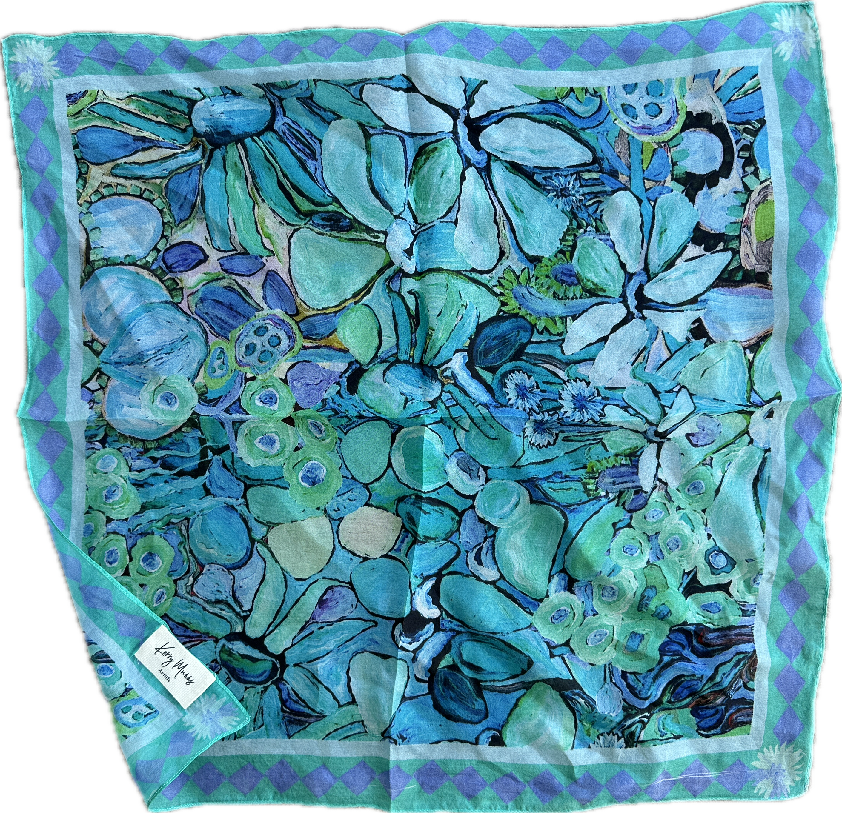 Blue and green wearable art silk bandanna featuring original abstract artwork by Kerry Munns styled as a soft bohemian headscarf