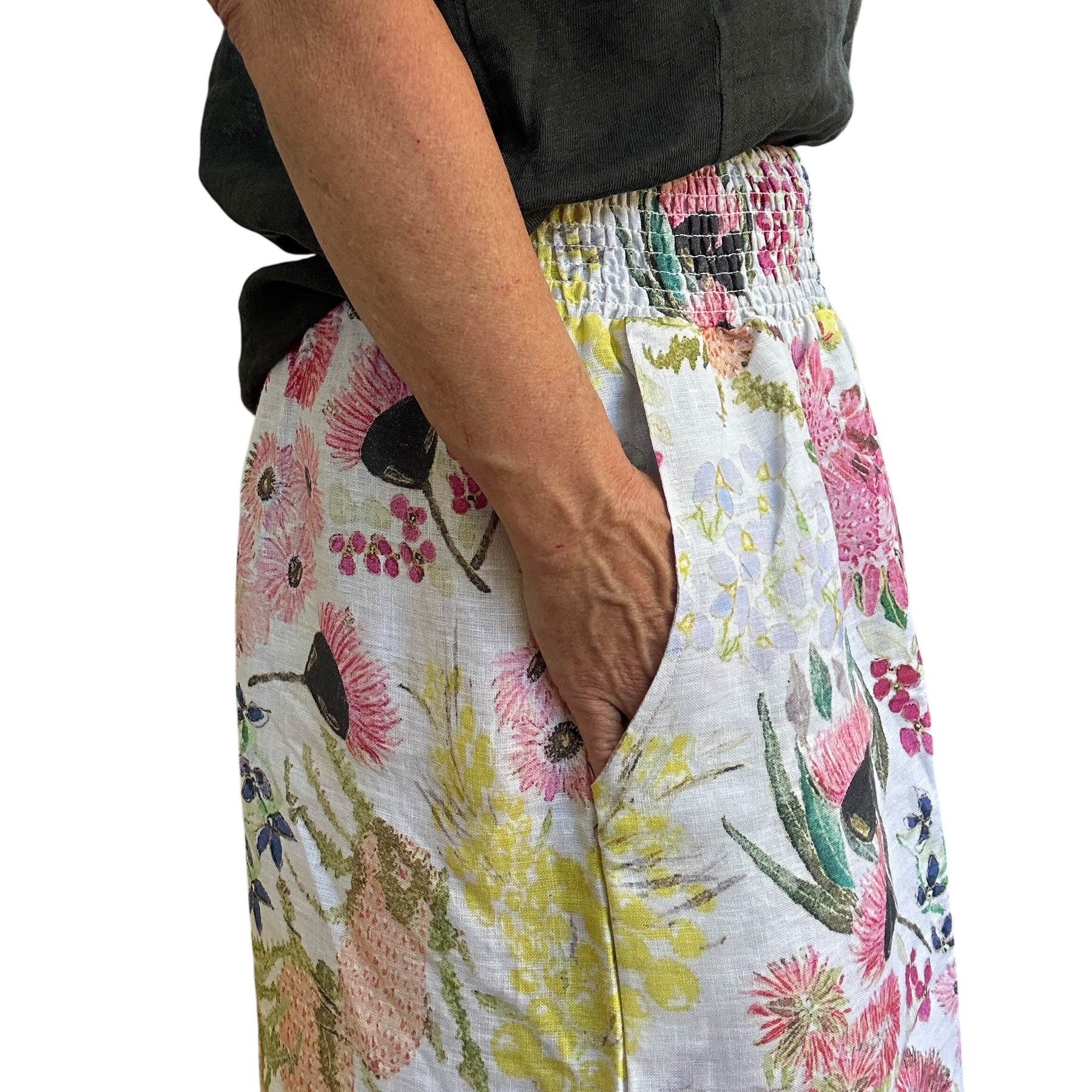 Kerry Munns wearable art Culotte linen pants in native floral print, full length wide leg womens linen pants with elastic waistband and deep side pockets side view.
