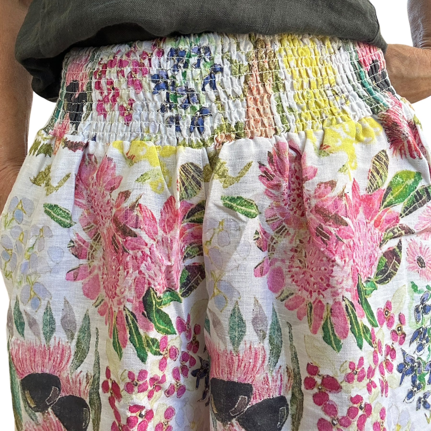 Kerry Munns wearable art Culotte linen pants in native floral print, full length wide leg womens linen pants with elastic waistband and deep side pockets close up view.