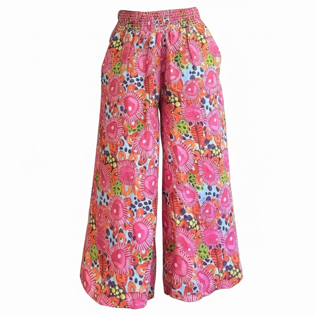 Kerry Munns wearable art Culotte linen pants in pink floral design with extra wide legs and elastic waistband, full length womens linen pants with deep side pockets Close up view.