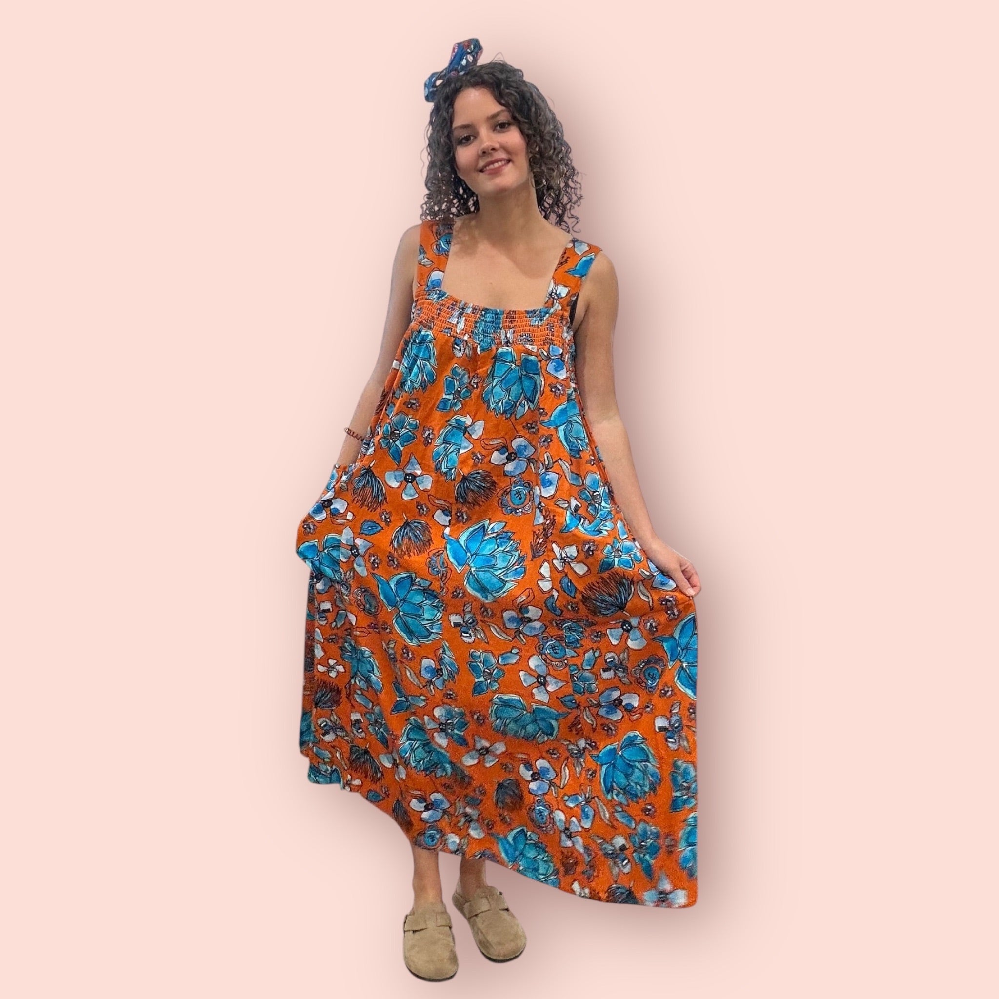 Plus-size linen dress in warm orange sunset colours, wearable abstract fashion for women