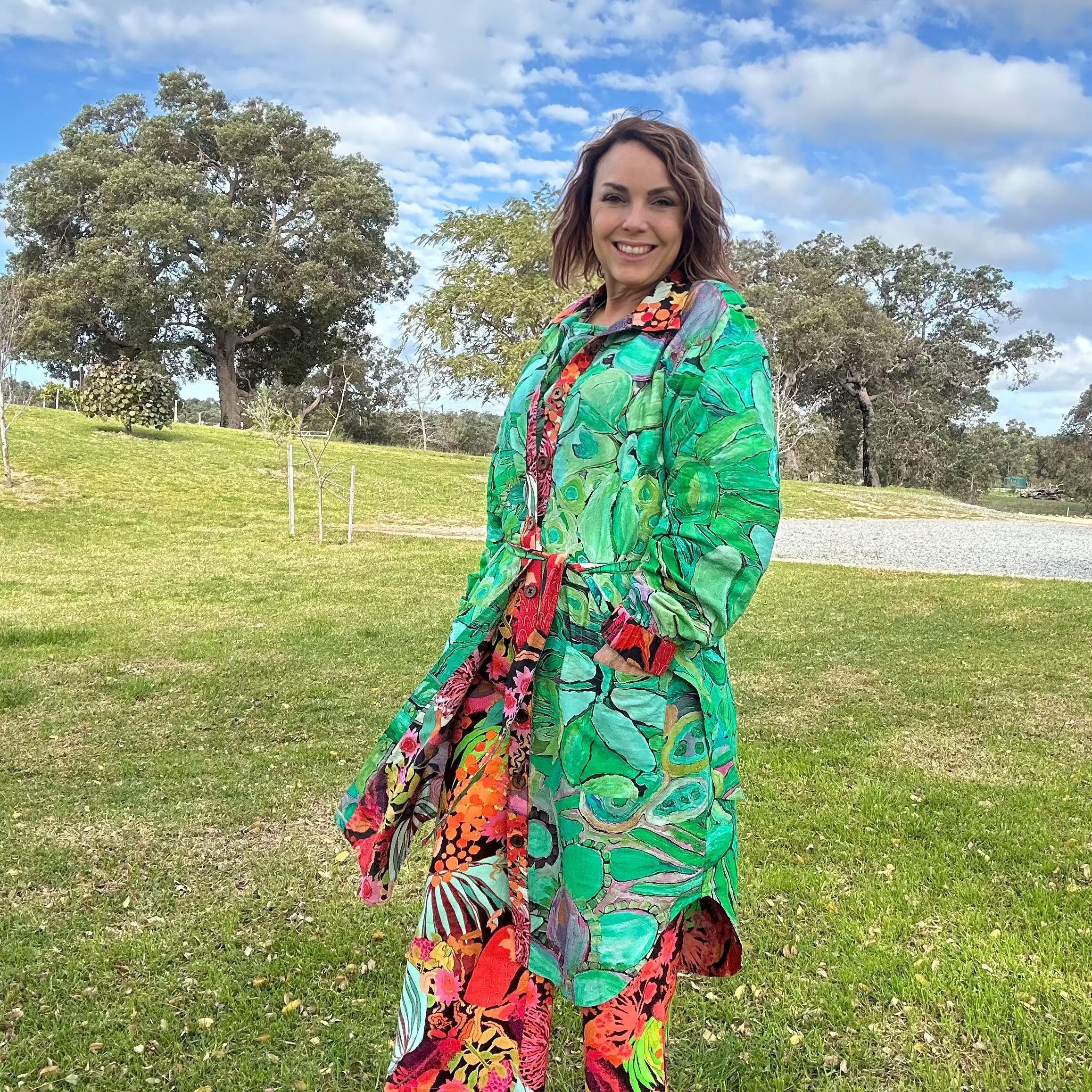 reversible coat dress in green and multicoloured australian bush scene