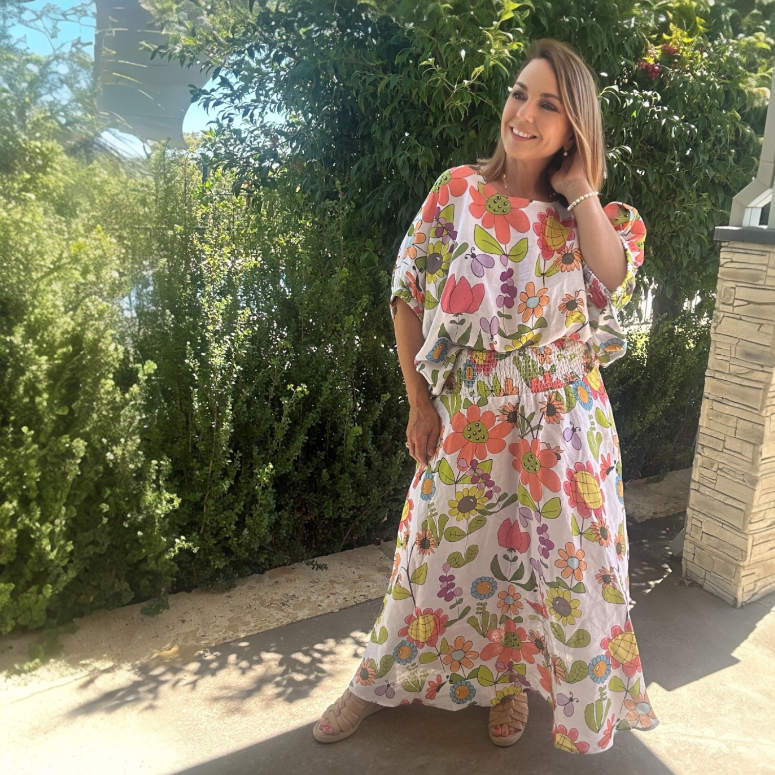 Women’s wearable art floral linen skirt in Vintage Garden Bloom print with elastic waist and pockets, full length sustainable women’s fashion