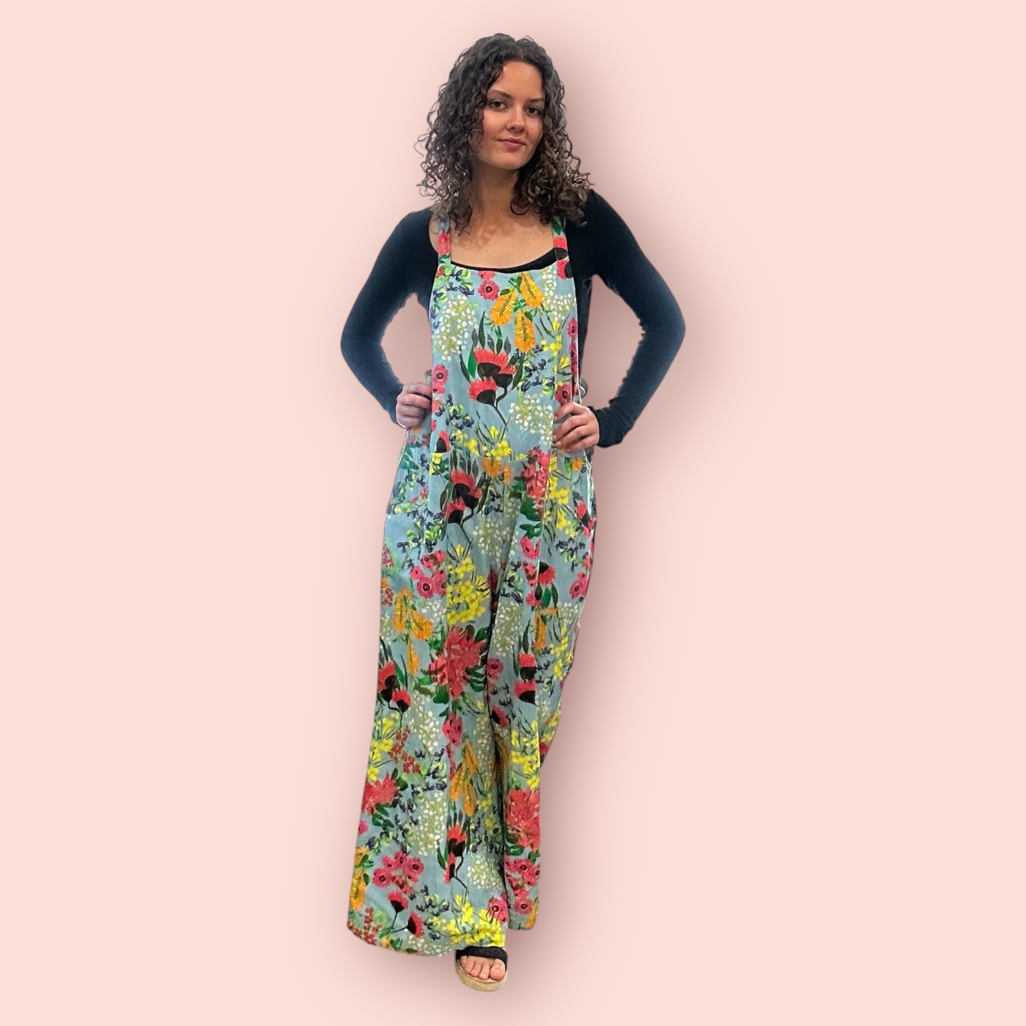 Vibrant painted jumpsuit combining movement and colour in a unique piece of women’s clothing,front view 2