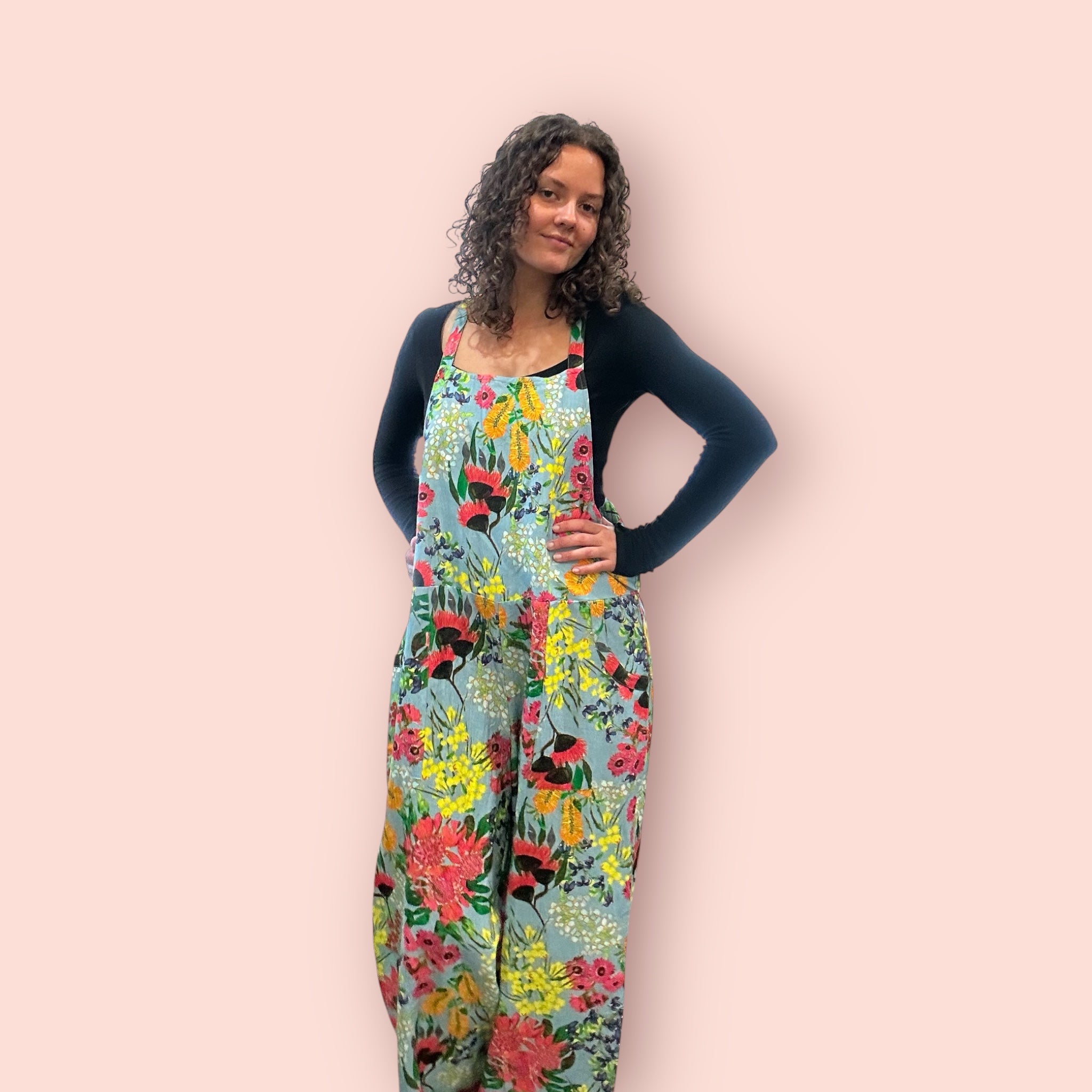 Vibrant painted jumpsuit combining movement and colour in a unique piece of women’s clothing Front view