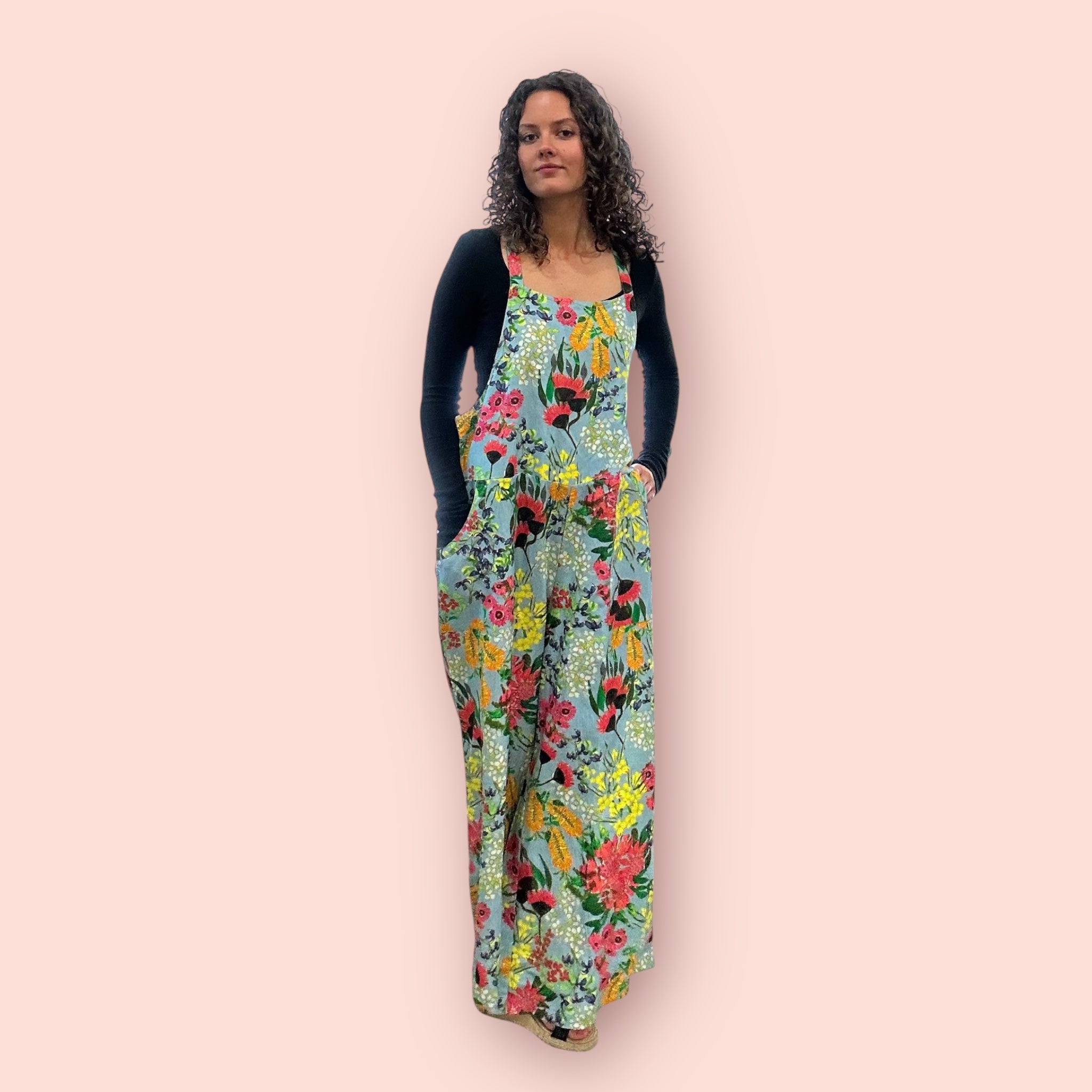 Vibrant painted jumpsuit combining movement and colour in a unique piece of women’s clothing